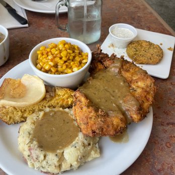 Sauce Boss Southern Kitchen - Chicken fried steak with mashed potatoes and corn. One of two fried tomatoes. - Southern Near Me - Draper, Utah Sauce Boss Southern Kitchen - Chicken fried steak with mashed potatoes and corn. One of two fried tomatoes. - Southern Near Me - Draper, Utah