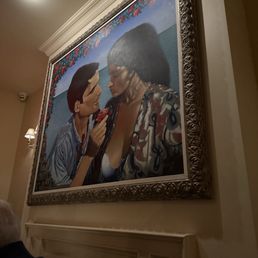 Painting of a scene from il Postino "the Postman" in one of the dining rooms