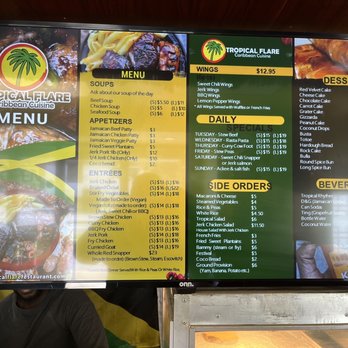 IRie Reggae Grill - Menu posted at counter. - Caribbean Near Me - Swiftwater, Pennsylvania