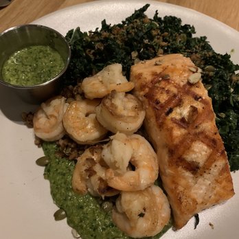 True Food Kitchen - 2/8/2020 grilled salmon , kale salad subbed instead of arugula and beets, quinoa extra pesto on side and side of shrimp . - New American Near Me - Austin, Texas True Food Kitchen - 2/8/2020 grilled salmon , kale salad subbed instead of arugula and beets, quinoa extra pesto on side and side of shrimp . - New American Near Me - Austin, Texas