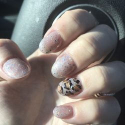 Rose gold gel polish and freehand cheetah art