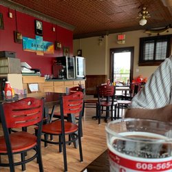 Bohicas Pub And Grub - Dining area near the bar and next to a patio deck.