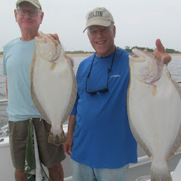 Gary (left) and Peter (right) after a nice day on the Sea Tiger---a GREAT boat. Gary (left) and Peter (right) after a nice day on the Sea Tiger---a GREAT boat.