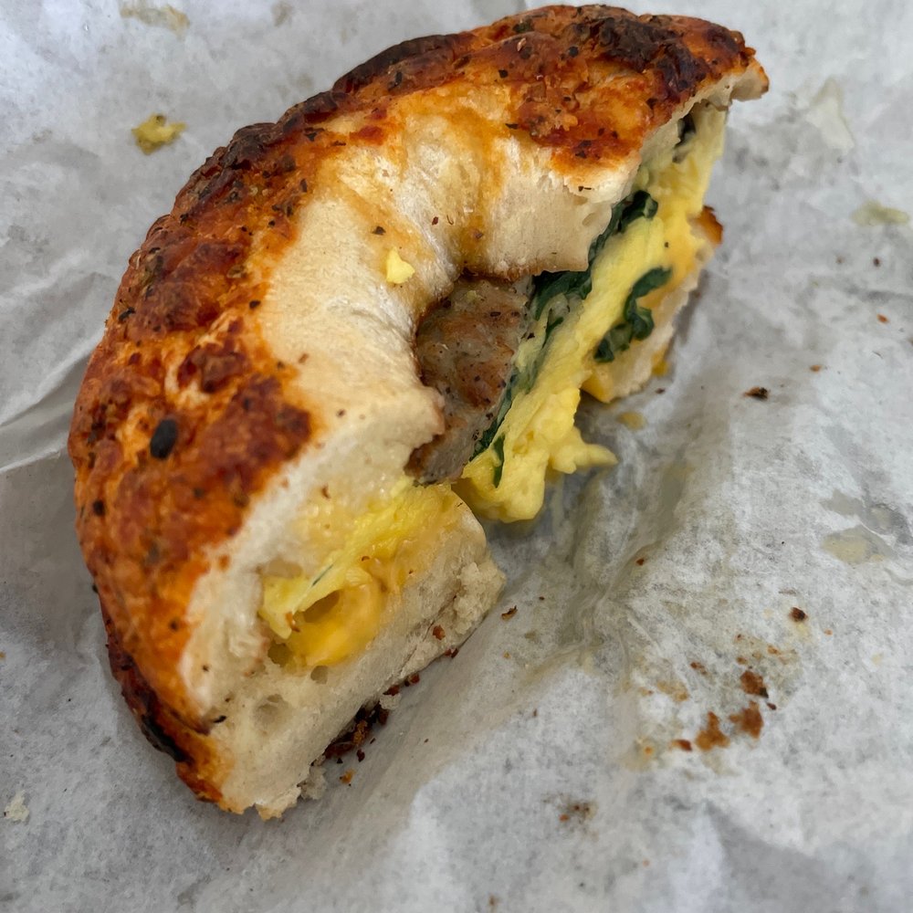 Bagel Junction - She recommended the pizza bagel for the sausage breakfast sandwich with mushrooms & spinach, SO GOOD! - Coffee & Tea Near Me - Auburn, California