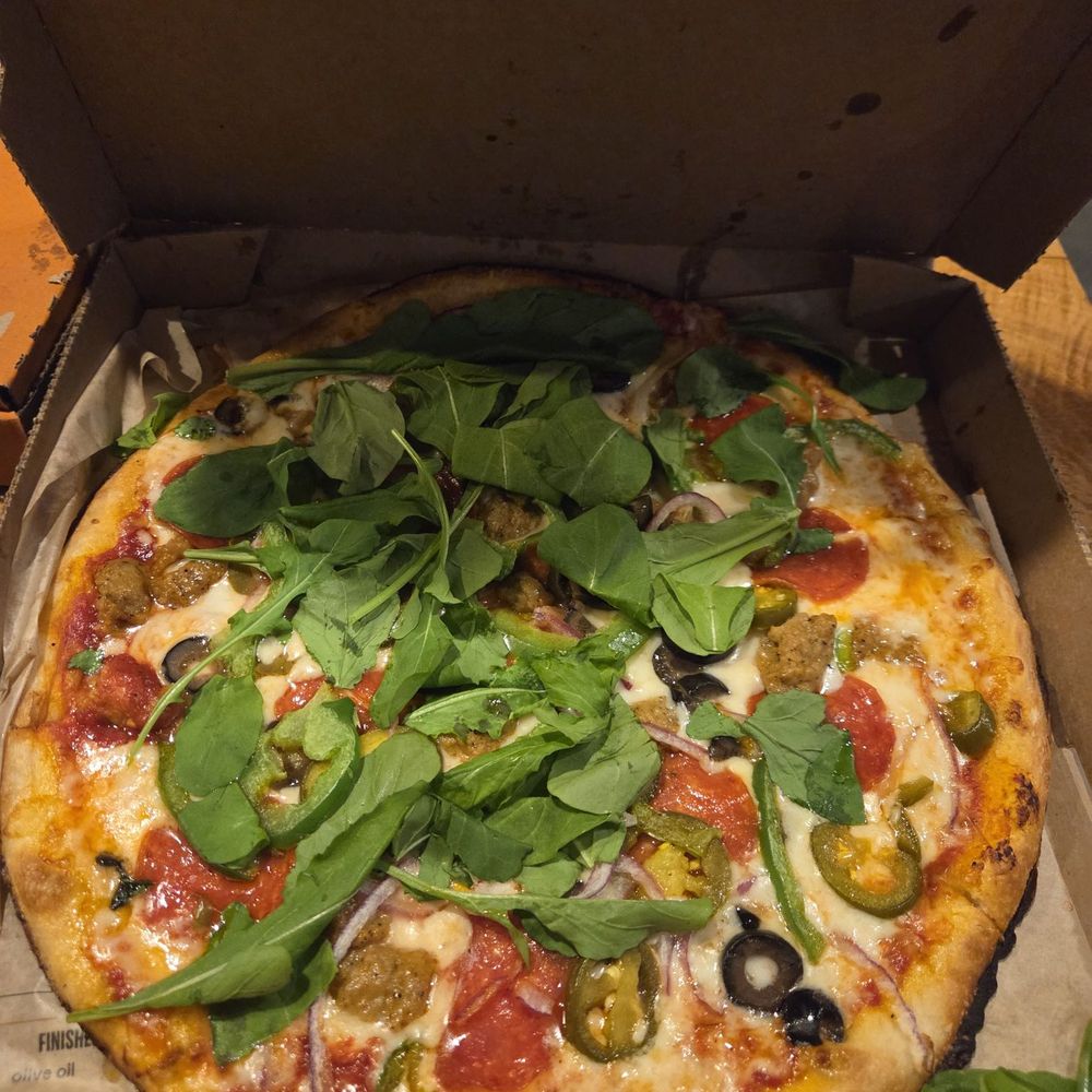 Arugula? I think not. That's some funny looking Arugula.