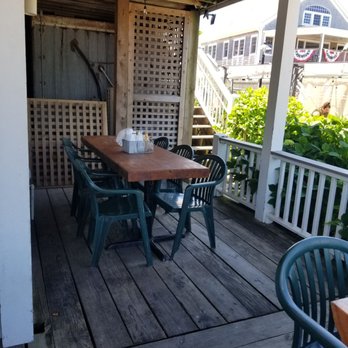 Poor People's Pub - Tables on front porch - Pubs Near Me - New Shoreham, Rhode Island Poor People's Pub - Tables on front porch - Pubs Near Me - New Shoreham, Rhode Island