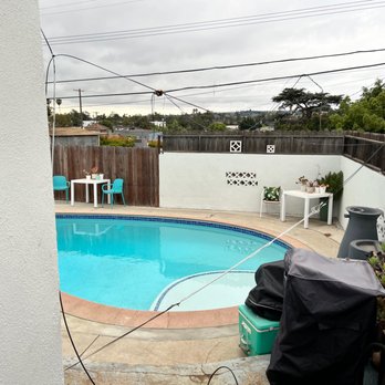 3D Tree Services, Inc. - Shot of tree location from back door, after removal. - Tree Services Near Me