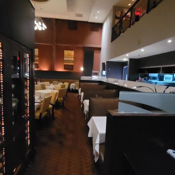 Ruth's Chris Steak House - A view into one of the seating areas - Steakhouses Near Me - Cary, North Carolina Ruth's Chris Steak House - A view into one of the seating areas - Steakhouses Near Me - Cary, North Carolina