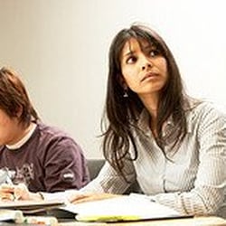 Veritas Prep - A Veritas Prep GMAT student listens to her expert instructor