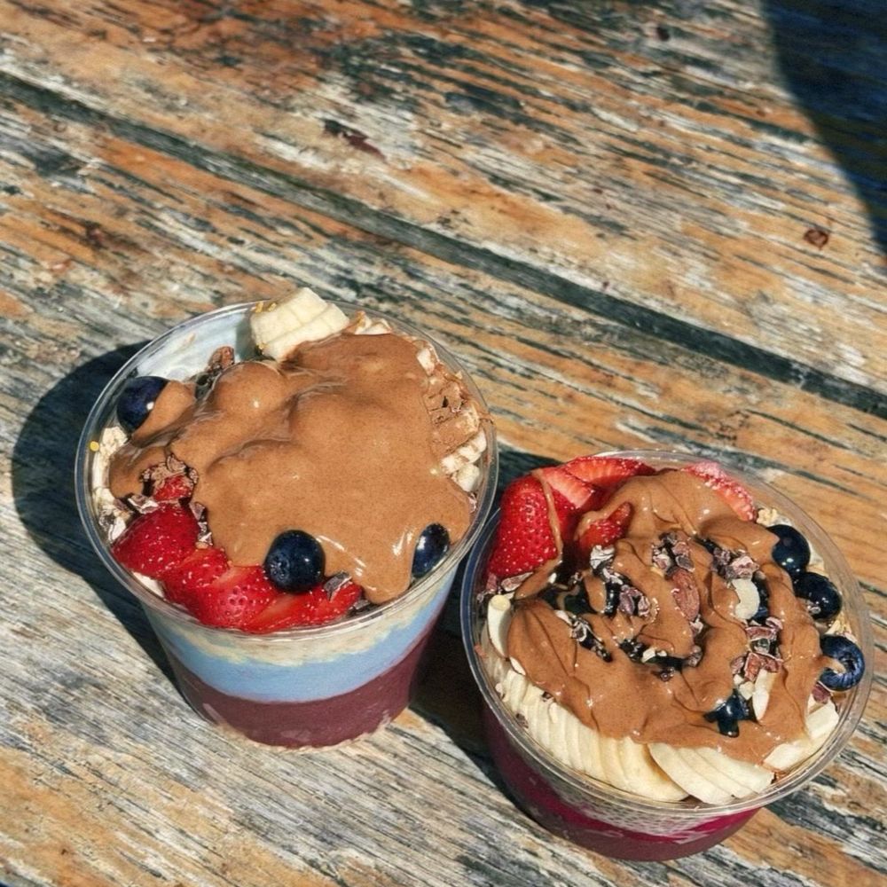 large acai bowl to the left and regular on the right