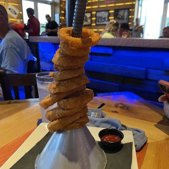 Ford's Garage St. Augustine - Onion rings served on a oil funnel. - Burgers Near Me - St. Augustine, Florida
