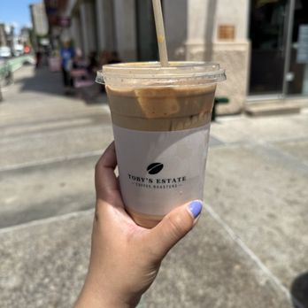 Toby's Estate - Iced hazelnut latte with Toby's milk - Coffee & Tea Near Me - New York, New York Toby's Estate - Iced hazelnut latte with Toby's milk - Coffee & Tea Near Me - New York, New York