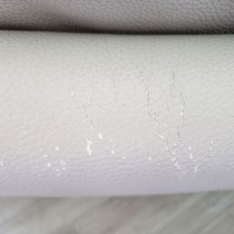 Cracked leather and worn down finish from excessive brush on drill