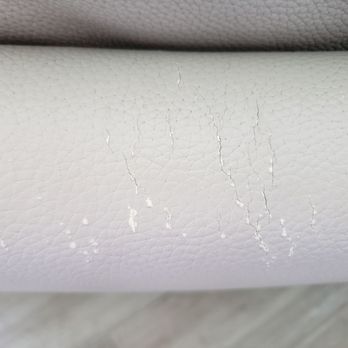 Boss Optima - Cracked leather and worn down finish from excessive brush on drill - Carpet Cleaning Near Me