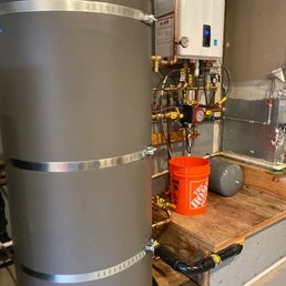 Replaced 4 old leaky hot water heater tanks with one hot water tank and boiler.