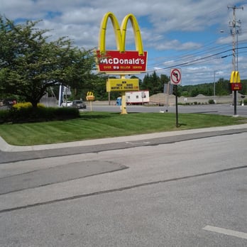 McDonald's - a mcdonald's sign on the corner of a street - Burgers Near Me - Old Town, Maine McDonald's - a mcdonald's sign on the corner of a street - Burgers Near Me - Old Town, Maine