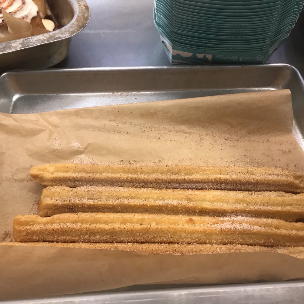 Cinnabon - a pan of churrons on a table - Bakeries Near Me - Philadelphia, Pennsylvania Cinnabon - a pan of churrons on a table - Bakeries Near Me - Philadelphia, Pennsylvania