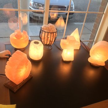 Makin'it Natural Health Food Store - a table with a variety of himalayan salt lamps - Health Markets Near Me - Clovis, New Mexico