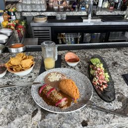 Chicken enchilada with Mole, shrimp ceviche Chicken enchilada with Mole, shrimp ceviche