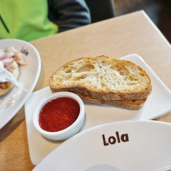 Lola - our waiter offered complement bread with special sauce which is very good - Greek Near Me - Seattle, Washington Lola - our waiter offered complement bread with special sauce which is very good - Greek Near Me - Seattle, Washington