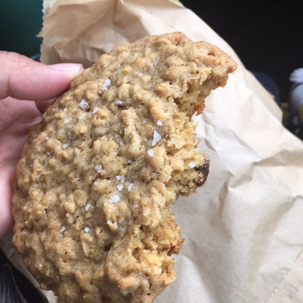 Revolution Roasters - Oatmeal chocolate chip sea salt Carmel drizzle cookie......oh wow.... I could eat like 3 of these in one sitting with my latte. - Coffee & Tea Near Me - Oceanside, California Revolution Roasters - Oatmeal chocolate chip sea salt Carmel drizzle cookie......oh wow.... I could eat like 3 of these in one sitting with my latte. - Coffee & Tea Near Me - Oceanside, California