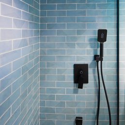 Terraform Construction - a shower in a tiled bathroom - General Contractors Near Me - Brooklyn, New York