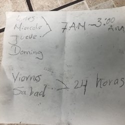 El Cerro Colorado - The hours of this place hand written by manager