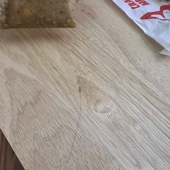 Jack in the Box - Hair being pulled from the food onto the table. I am bald and my daughter is blonde so it's definitely not ours - Fast Food Near Me - San Jose, California