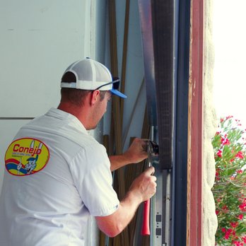 Conejo Services - Changing out the rollers on a heavy garage door - Heating & Air Conditioning/HVAC Near Me - Newbury Park, California Conejo Services - Changing out the rollers on a heavy garage door - Heating & Air Conditioning/HVAC Near Me - Newbury Park, California