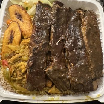 Da Jerk House - These bbq jerk pork ribs was everything. I got that with the rice, peas and cabbage with curry over that, and fried plantains. - Caribbean Near Me - Morningside, Maryland Da Jerk House - These bbq jerk pork ribs was everything. I got that with the rice, peas and cabbage with curry over that, and fried plantains. - Caribbean Near Me - Morningside, Maryland