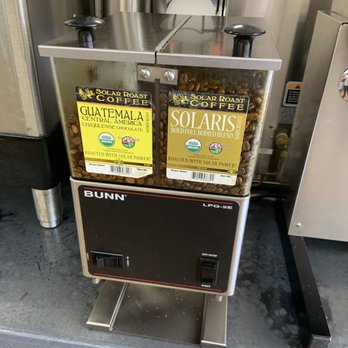 MAKS - a coffee machine with two bags of coffee on top of it - Mexican Near Me - Pueblo, Colorado MAKS - a coffee machine with two bags of coffee on top of it - Mexican Near Me - Pueblo, Colorado