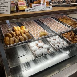 A variety of donuts with additional treats available for purchase.