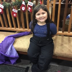 Travis Outdoor Recreation - My daughter trying on a snow bib. They also have sleds to rent also. Had a good time in Lake Tahoe.