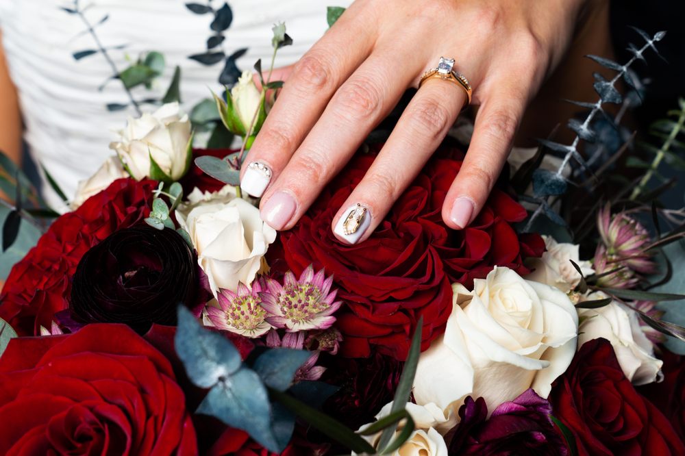 Nails by Us Logo