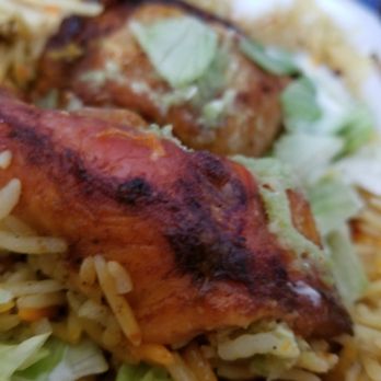 Mama Sahara - Quarter chicken and rice, the perfect amount of crispy on the outside and juicy on the inside! - Somali Near Me - Minneapolis, Minnesota Mama Sahara - Quarter chicken and rice, the perfect amount of crispy on the outside and juicy on the inside! - Somali Near Me - Minneapolis, Minnesota