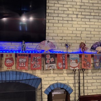 Tokyo Steakhouse - a brick fireplace with a blue light - Japanese Near Me - Queensbury, New York Tokyo Steakhouse - a brick fireplace with a blue light - Japanese Near Me - Queensbury, New York