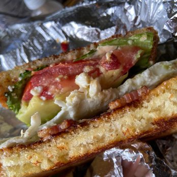 Rusty Pot Café - The Overload Breakfast Sandwich $16.  So good, it comes with breakfast potatoes. - Breakfast & Brunch Near Me - Inglewood, California
