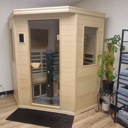 Simply Sauna - Sauna Room #2 allows one to experience the benefits of infrared sauna combined with red light therapy inside the cabin.