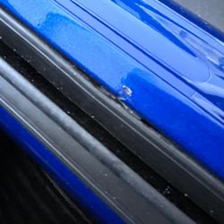 Blue Collar Muscle Rods & Custom - more tool marks in the paint from the replacement of the belt line molding.