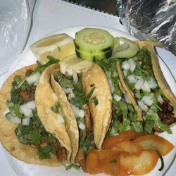 2 crispy to perfect tripa tacos, one flavorful cabeza, and one pasta taco. All delicious definitely coming back
