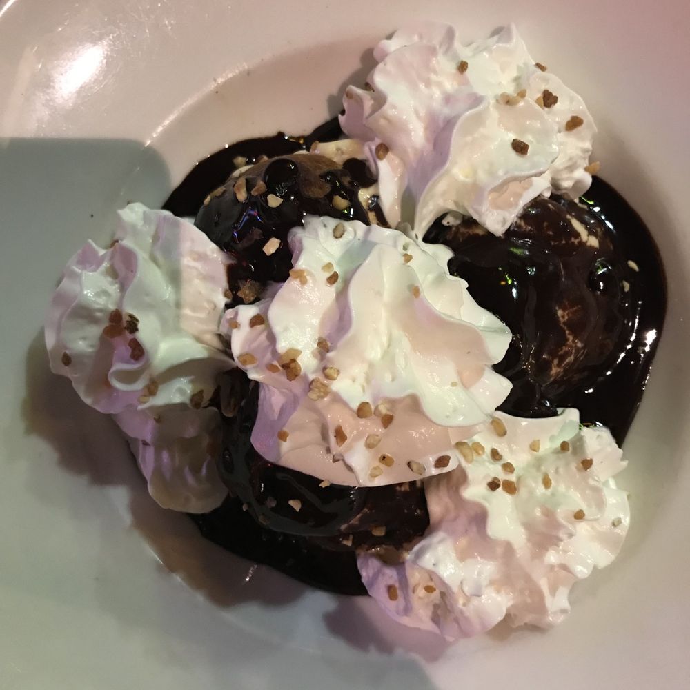 La Cave Gourmande - Profiteroles with chocolate syrup and vanilla ice cream - Bistros Near Me - Paris, 75 La Cave Gourmande - Profiteroles with chocolate syrup and vanilla ice cream - Bistros Near Me - Paris, 75