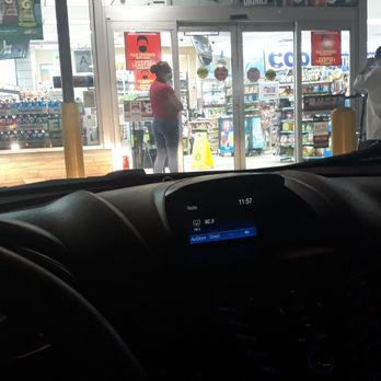 ampm - People standing outside waiting for the doors to open to pay for gas. Little they know the 2 workers closed the store down - Convenience Stores Near Me - Rialto, California