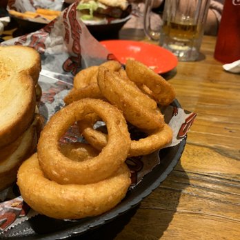 Mugshots Grill & Bar - Saraland, AL - Order of yummy onion rings - Sports Bars Near Me - Saraland, Alabama