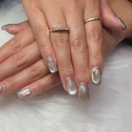 Silver Cat Eye with gold design. Silver Cat Eye with gold design.