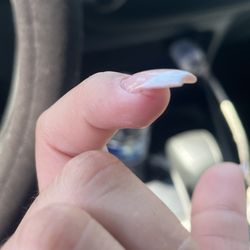 Exotic Nails - Both cuts she did to me Never again