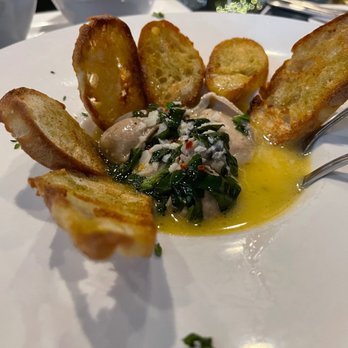 Liquid Lib's - Oysters in wine sauce - Wine Bars Near Me - Lutherville-Timonium, Maryland