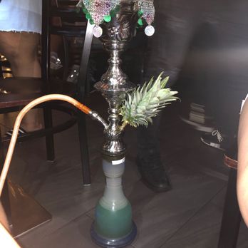 718 Hookah Lounge & Grill - 718 Specialty: Party on the beach; Fresh pineapple bowl, combo of tropical flavors sex on the beach cocktail base. - Hookah Bars Near Me - Forest Hills, New York