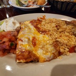 Chicken enchiladas, rice and beans. Delicious.