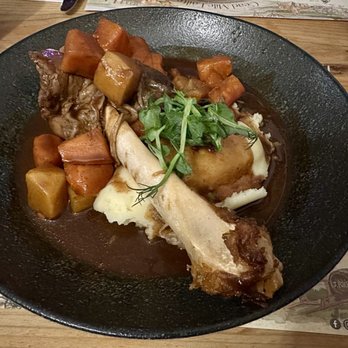 Johnnie Fox's Pub - Lamb shank with mashed potatoes and veggies. - Gastropubs Near Me - Dublin, D Johnnie Fox's Pub - Lamb shank with mashed potatoes and veggies. - Gastropubs Near Me - Dublin, D
