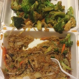 Broccoli with garlic sauce and vegetable fried rice. Broccoli with garlic sauce and vegetable fried rice.